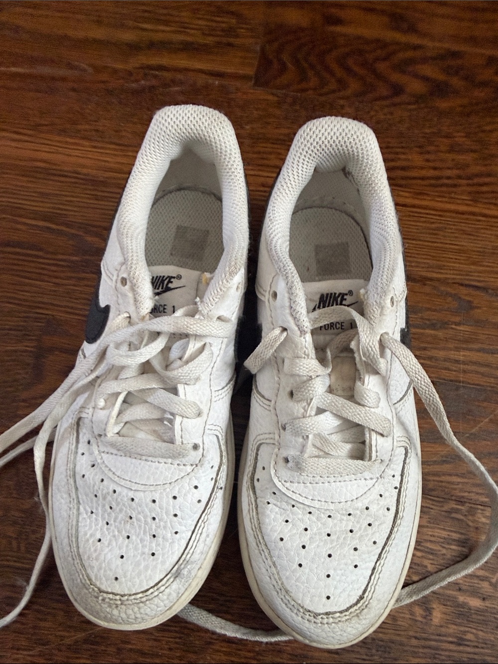 Nike White Sneakers with Black Swoosh